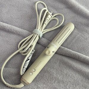 Lange Beige Hair Tool
